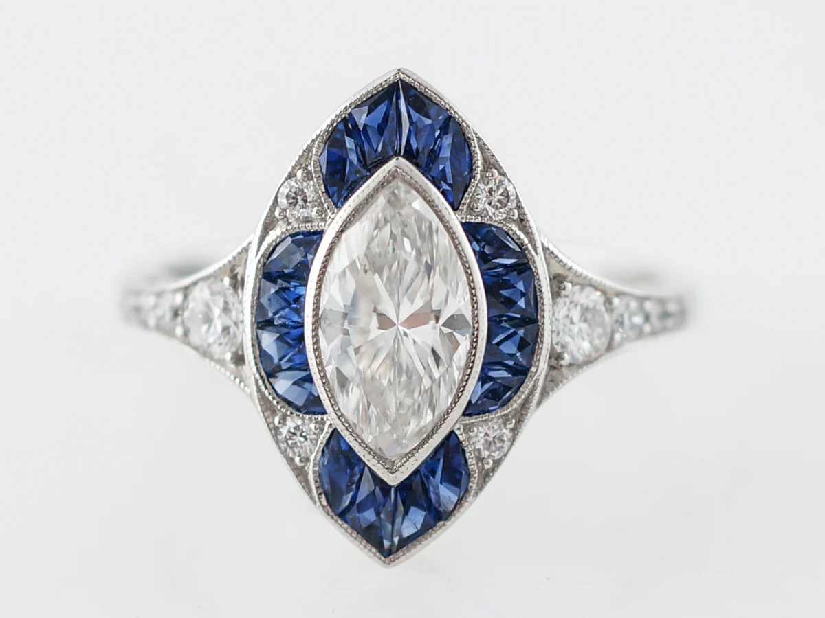 1 Carat Marquis Cut Diamond & Sapphire Halo Ring in Platinum