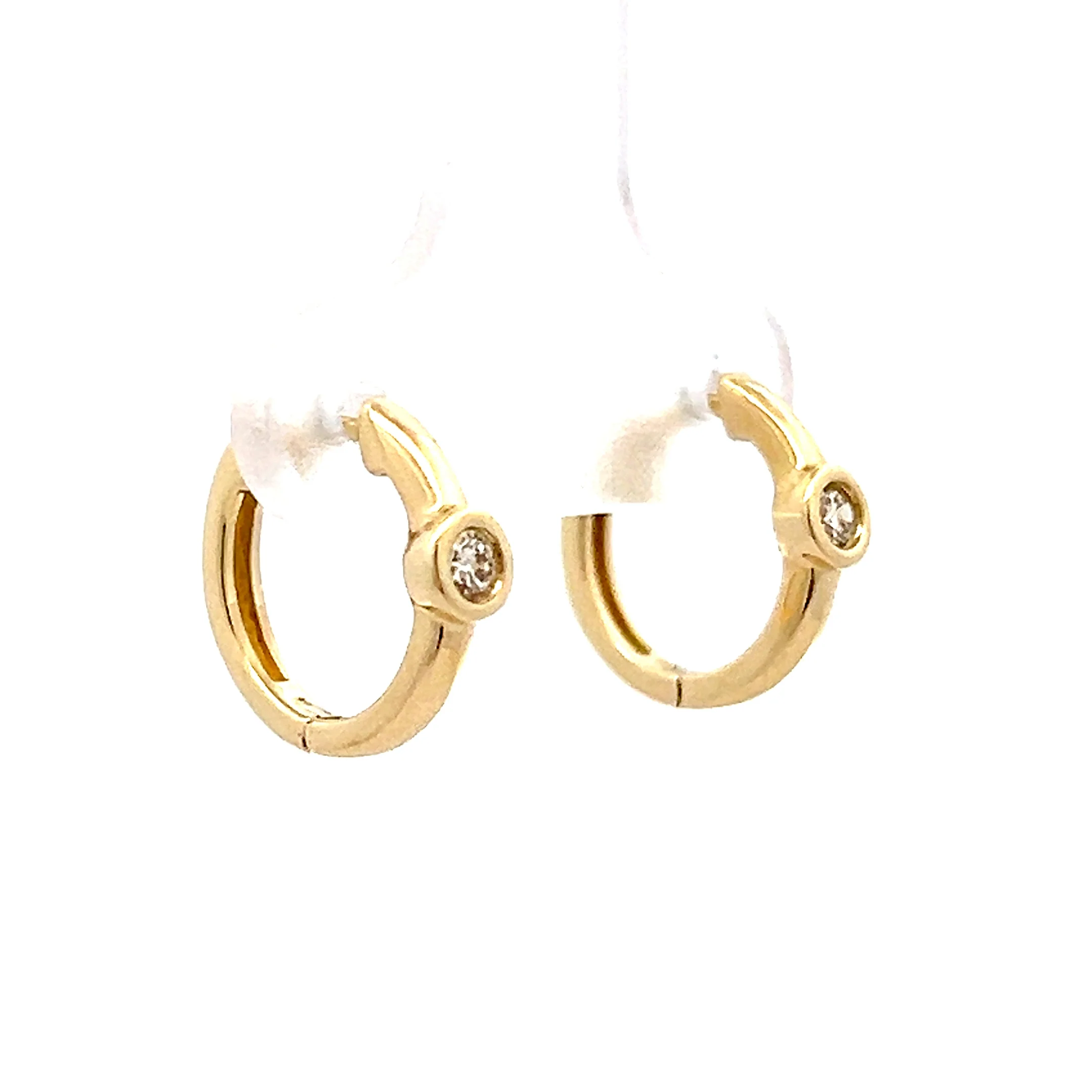 .10 Huggie Hoop Earrings in 14k Yellow Gold - Image 3