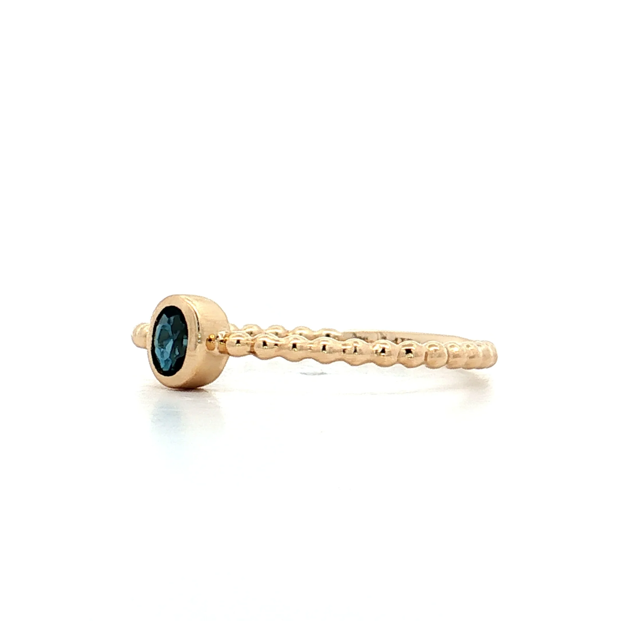 .15 Oval Blue Topaz Stacking Ring 14k Yellow Gold - Image 2