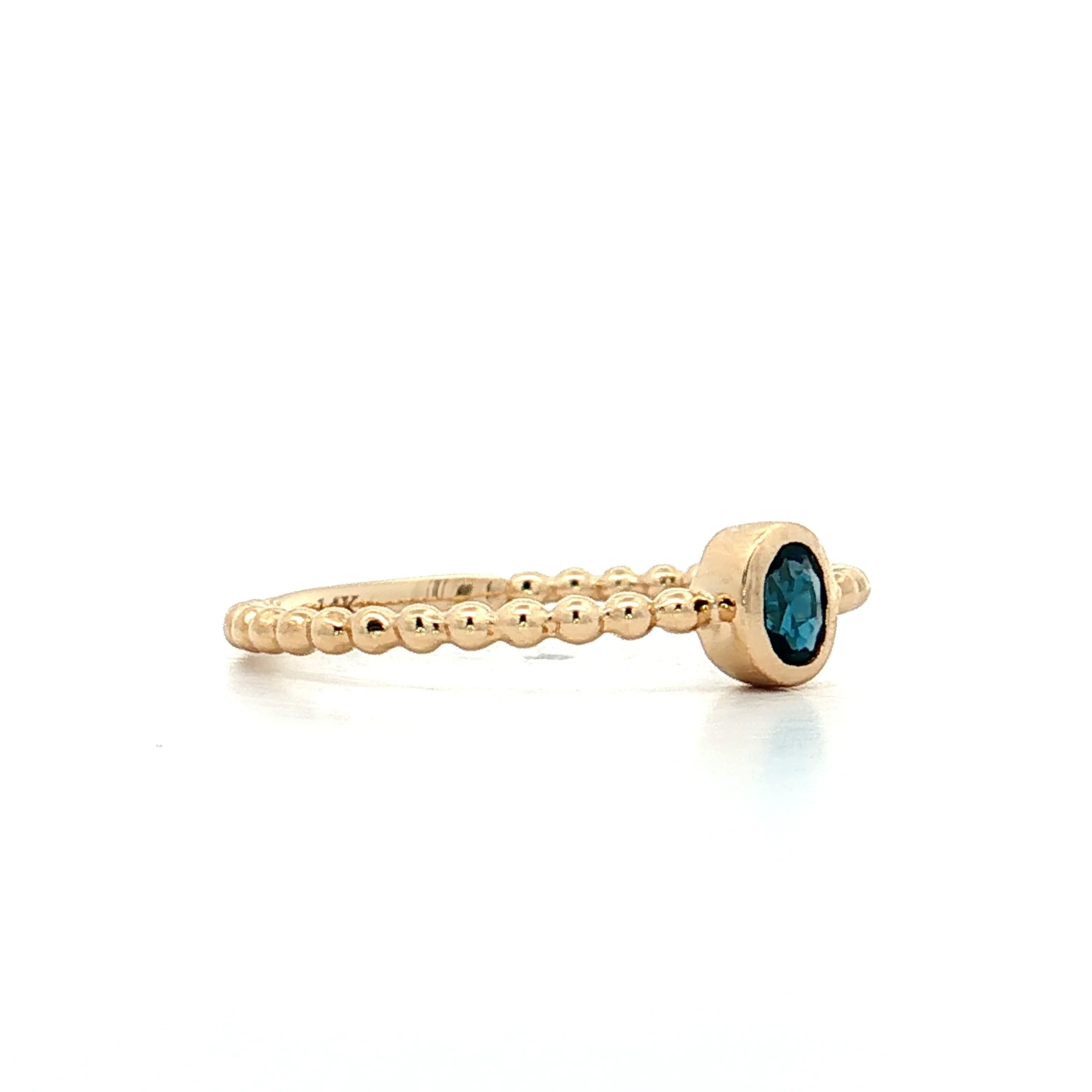 .15 Oval Blue Topaz Stacking Ring 14k Yellow Gold - Image 3