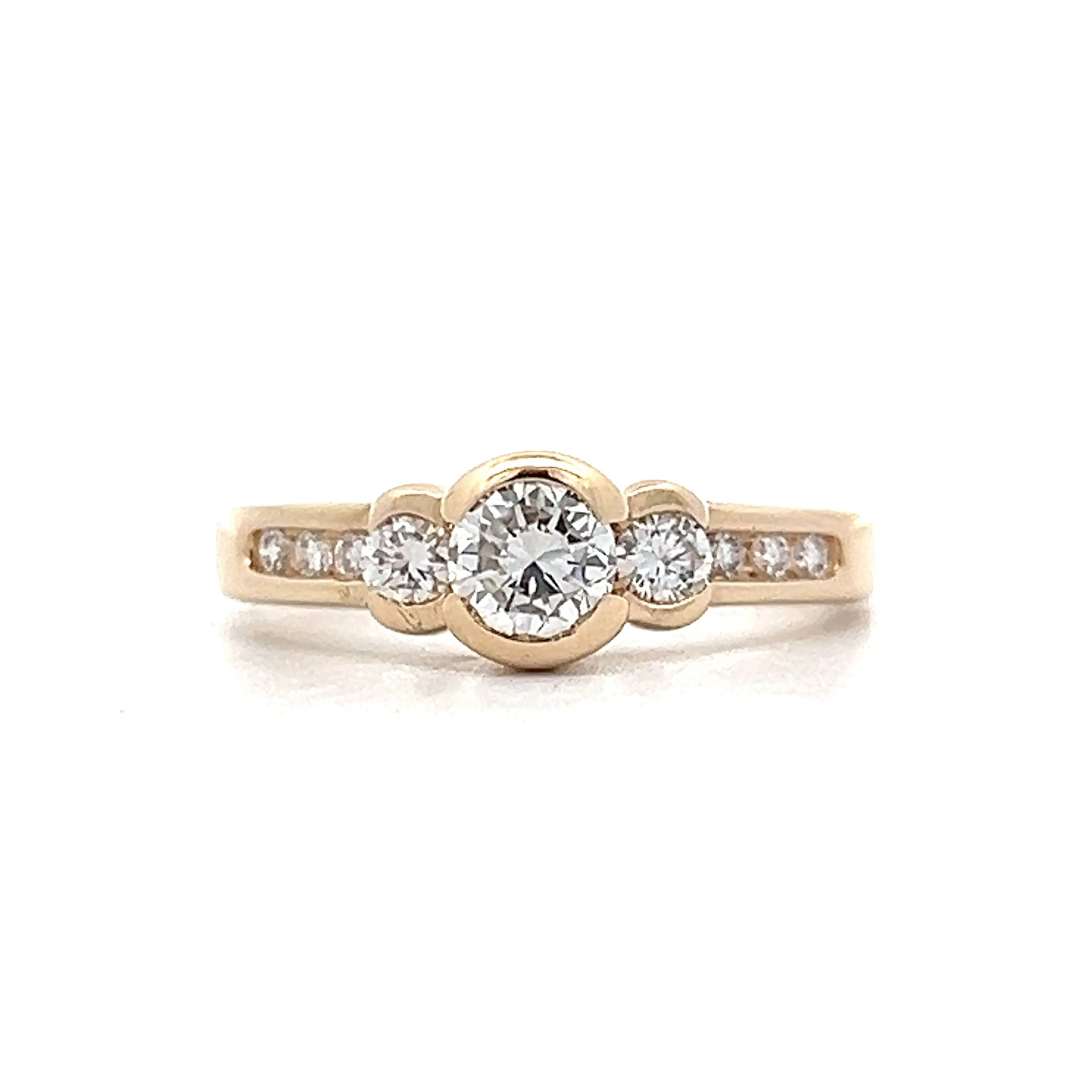 .38 Bezel Three Stone Engagement Ring in Yellow Gold
