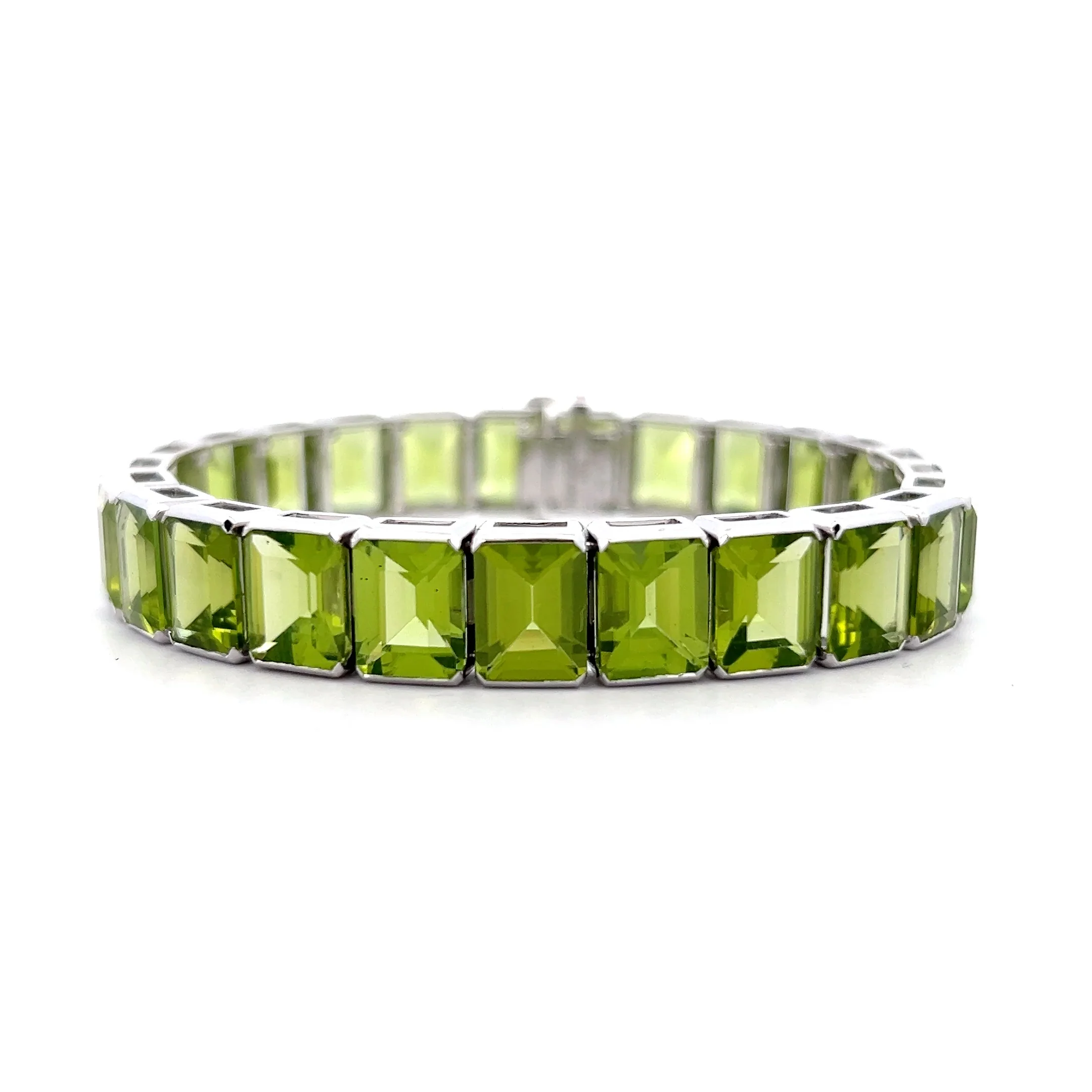 57.22 Emerald Cut Peridot Line Bracelet Platinum