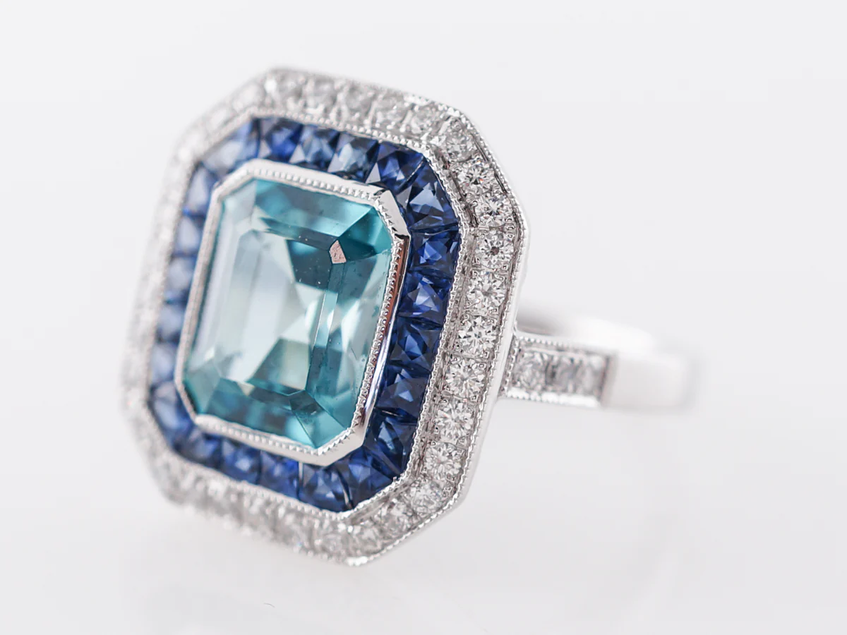 Blue Zircon Ring with Sapphire & Diamond Halo - Image 2