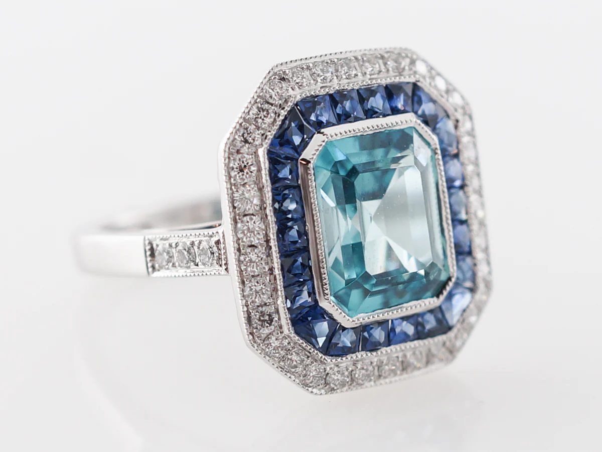 Blue Zircon Ring with Sapphire & Diamond Halo - Image 3