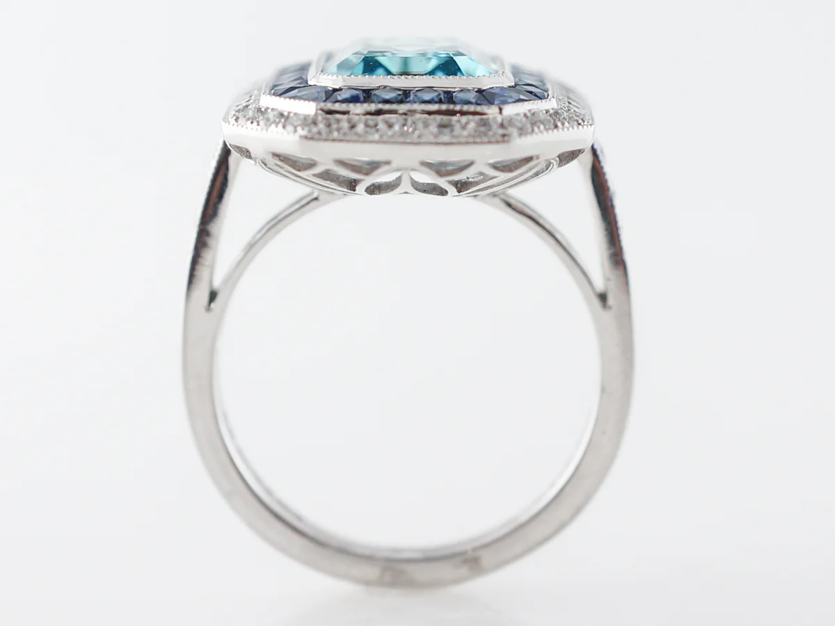Blue Zircon Ring with Sapphire & Diamond Halo - Image 4