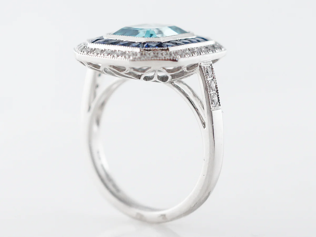 Blue Zircon Ring with Sapphire & Diamond Halo - Image 5