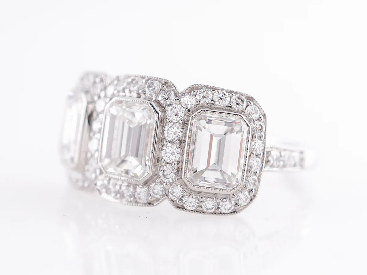 Deco Style Three Stone Emerald Cut Diamond Ring in Platinum - Image 2