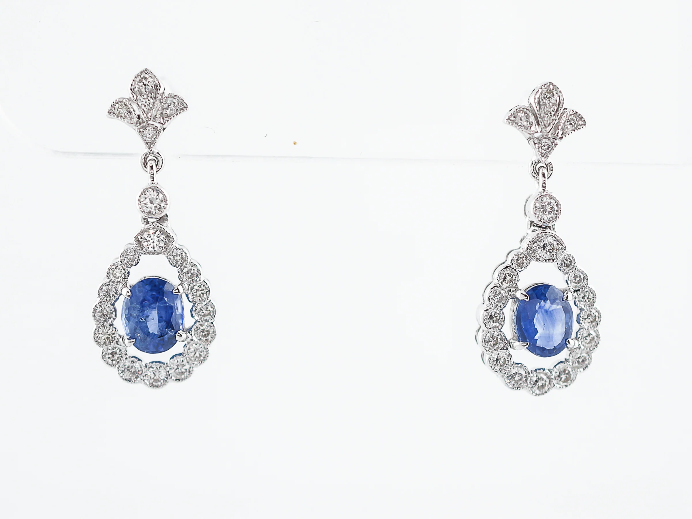 Earrings Modern 1.61 Oval Cut Sapphires & .61 Round Brilliant Cut Diamonds in 18k White Gold