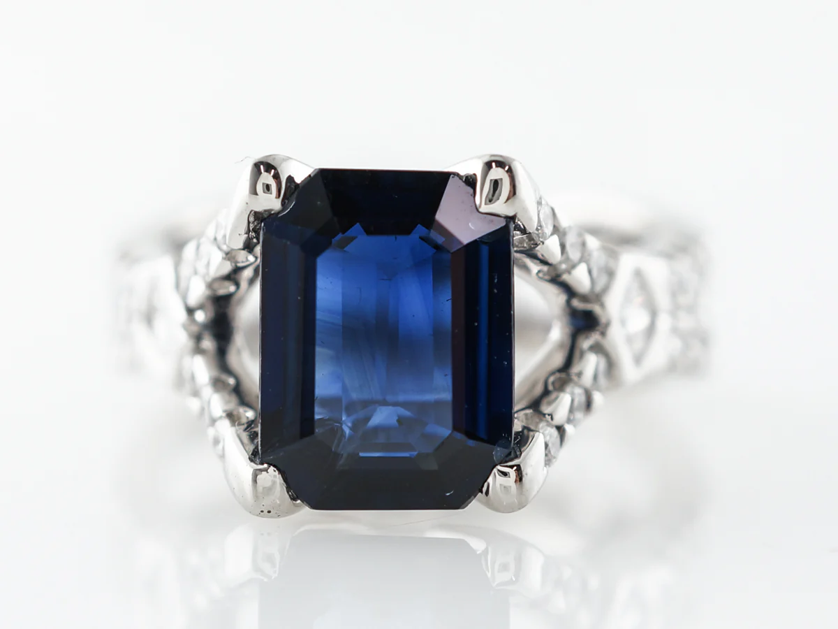 Emerald Cut Sapphire & Diamond Ring in Platinum