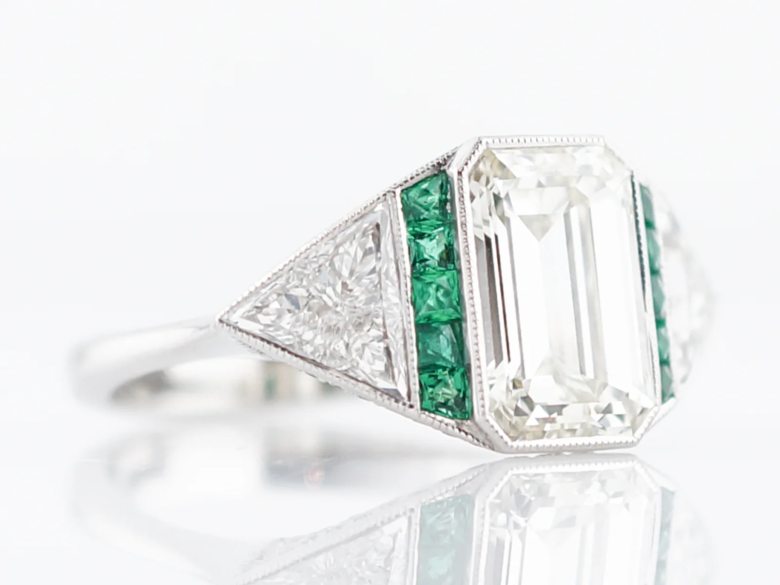 Engagement Ring Modern 2.51 Emerald Cut Diamond & .15 Emeralds in Platinum - Image 4