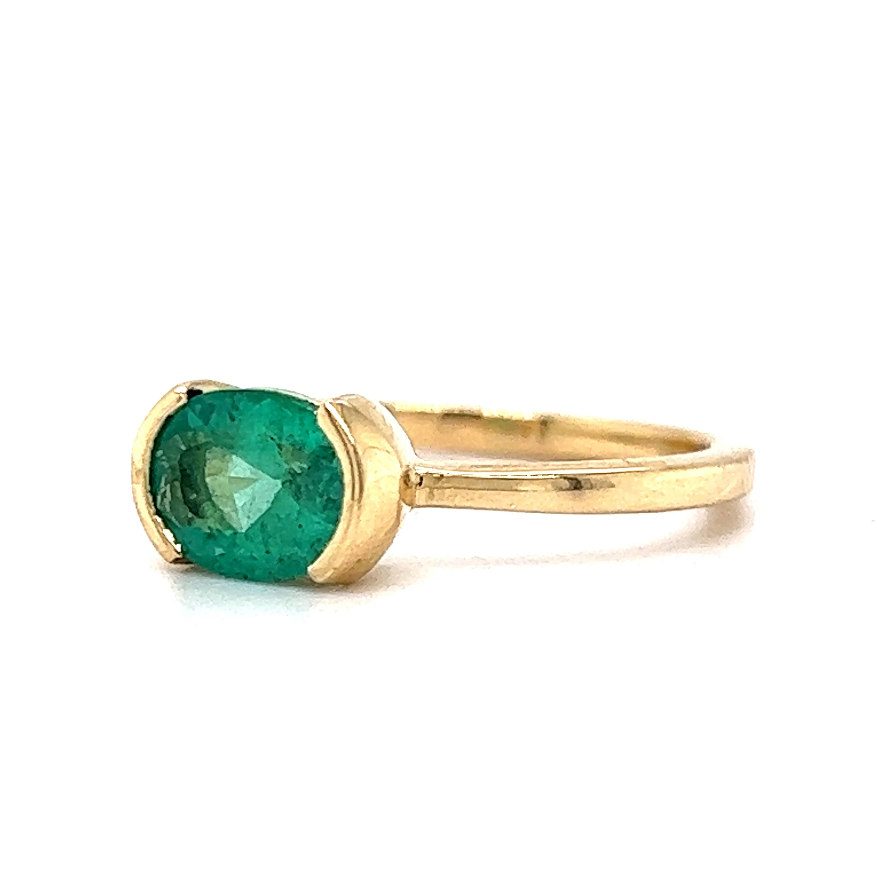 Half Bezel Set Oval Cut Emerald Ring in 14k Yellow Gold - Image 2