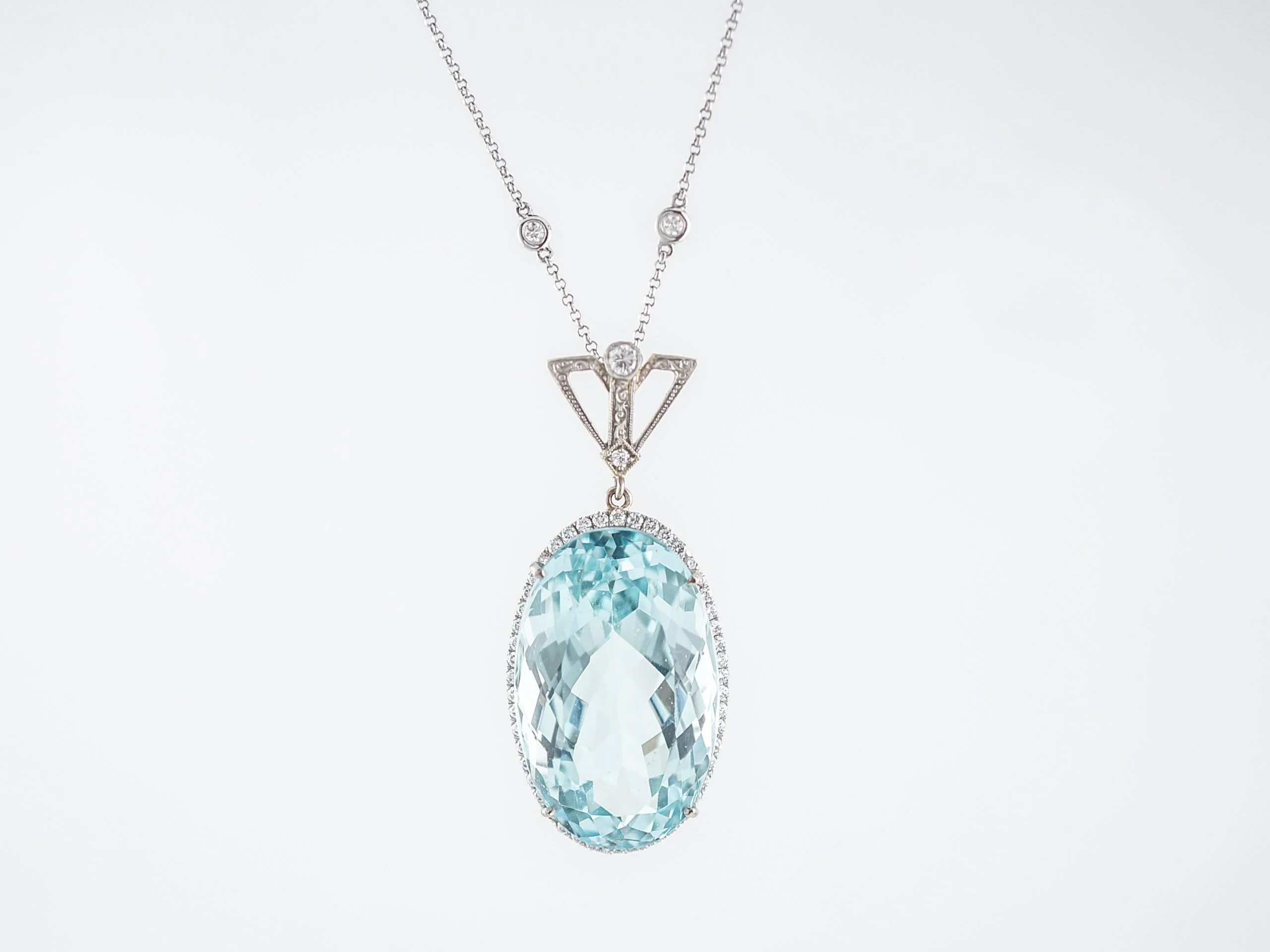 Modern Pendant 29.29 Oval Cut Aquamarine & 1.15 Round Brilliant Cut Diamonds in 18k White Gold