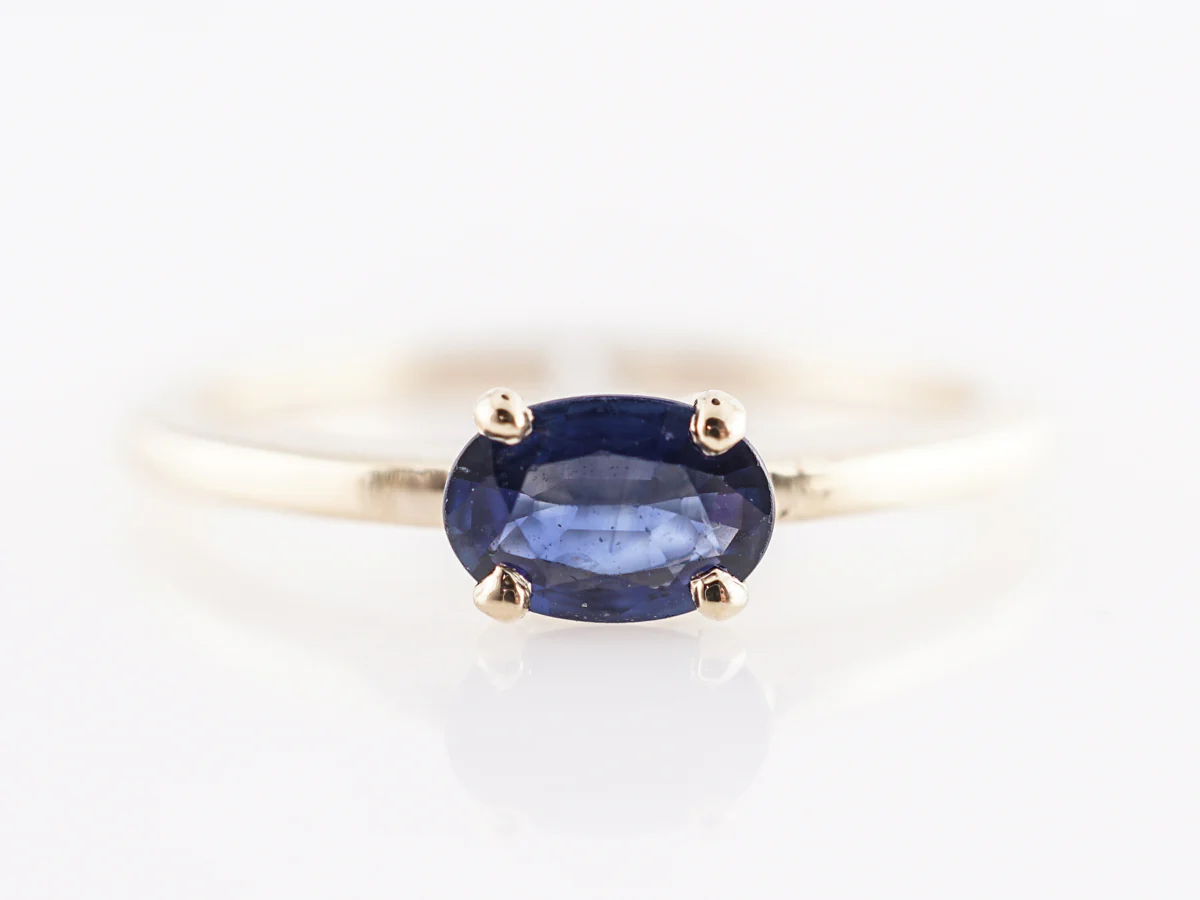 Oval Cut Sapphire Engagement Ring in 14K Yellow Gold
