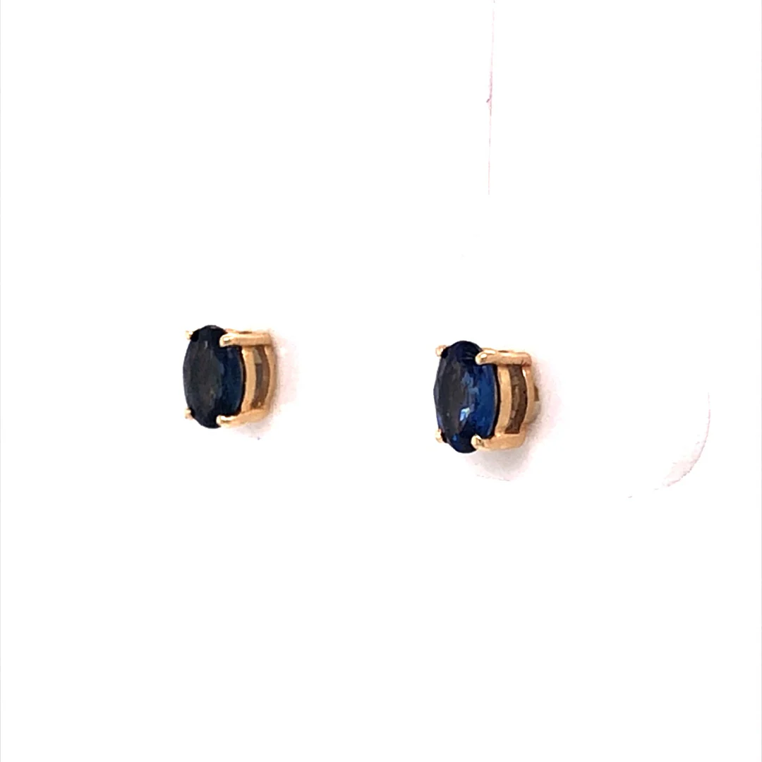 Oval Cut Sapphire Stud Earrings in 14k Yellow Gold - Image 2