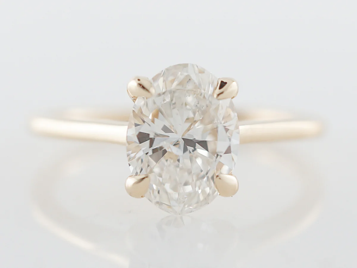 Oval Diamond Solitaire Engagement Ring in Yellow Gold