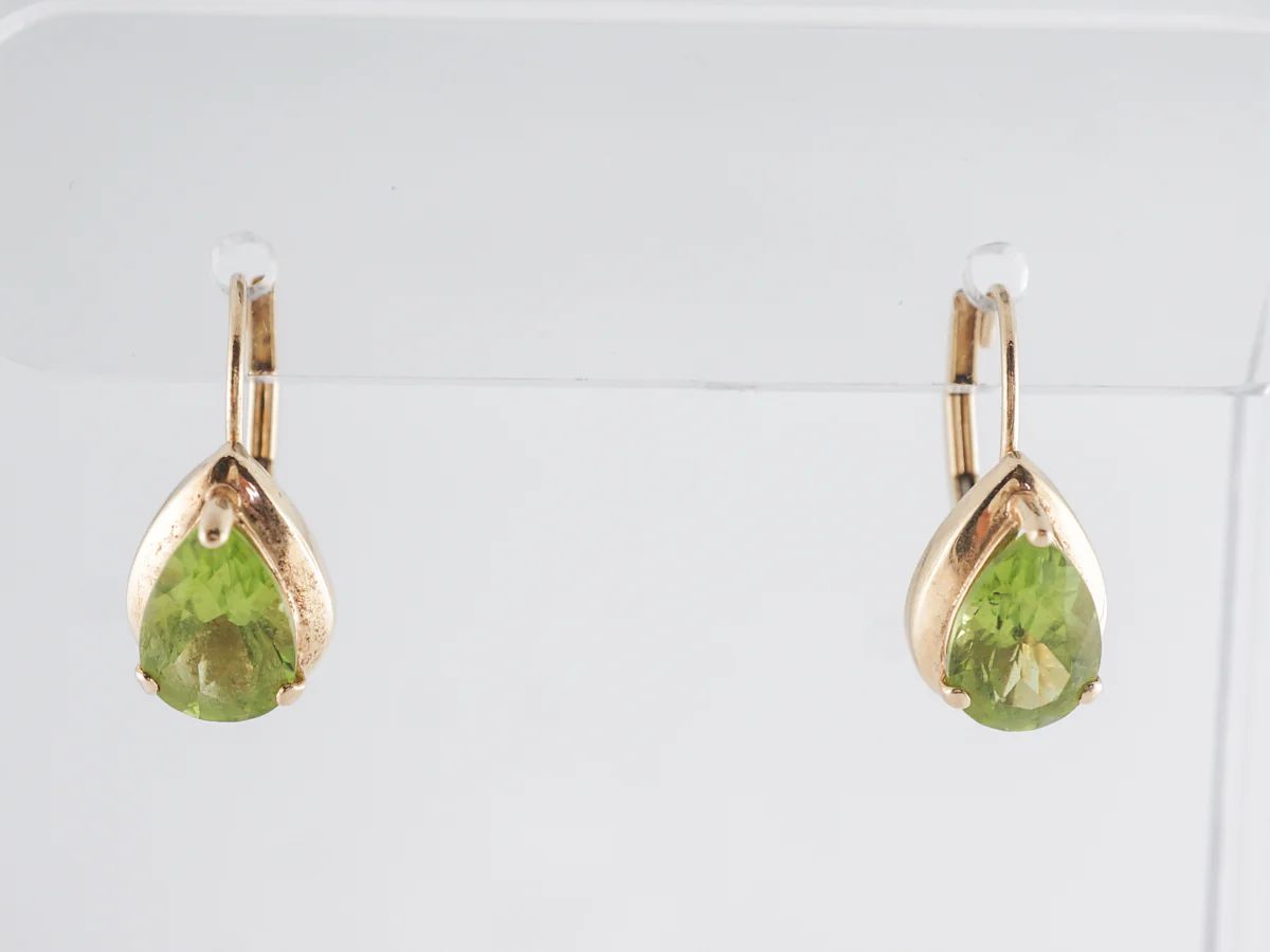 Pear Shaped Peridot Earrings in 14k Yellow Gold