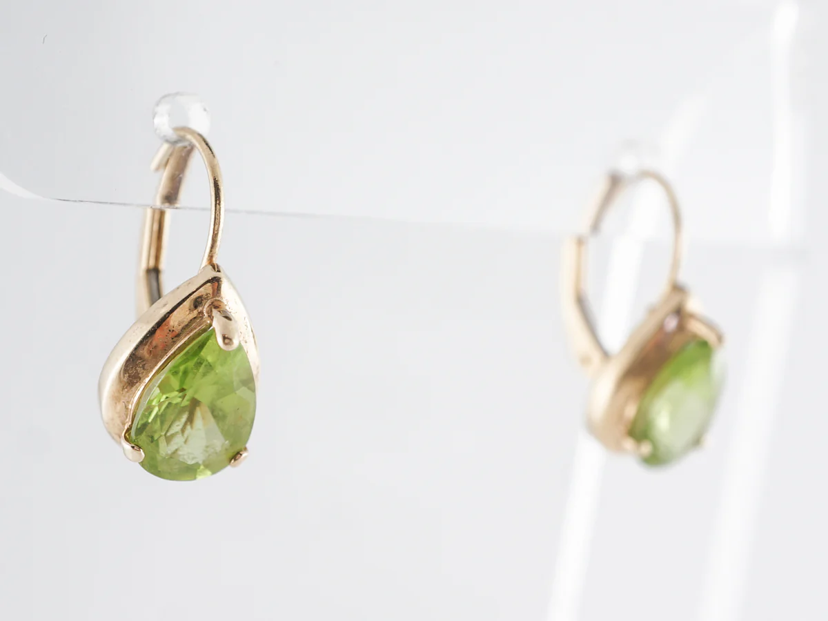 Pear Shaped Peridot Earrings in 14k Yellow Gold - Image 2