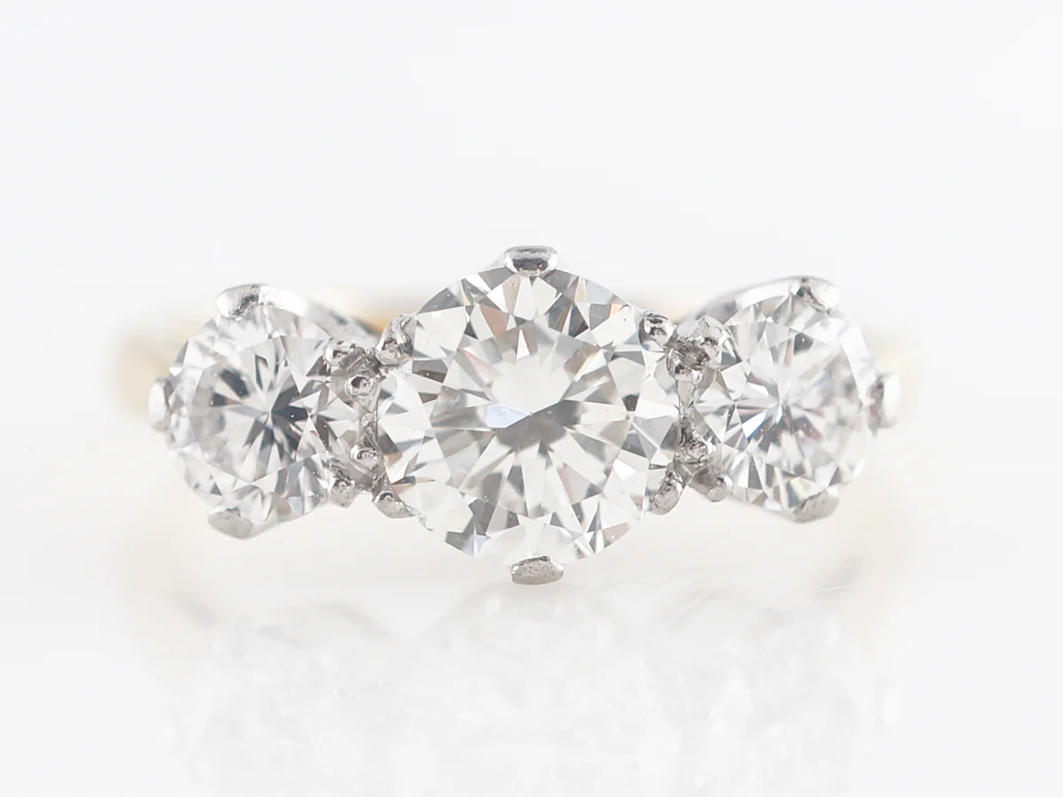 Retro Three Stone Engagement Ring in Platinum and Yellow Gold