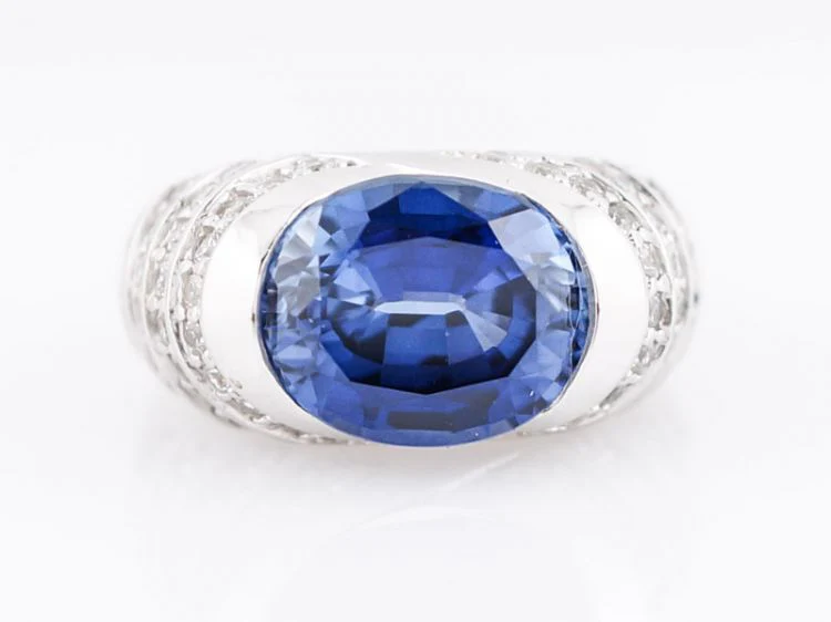 Right Hand Ring Modern 4.60 Oval Cut Tanzanite & 1.12 Round Brilliant Cut Diamonds in 14k White Gold