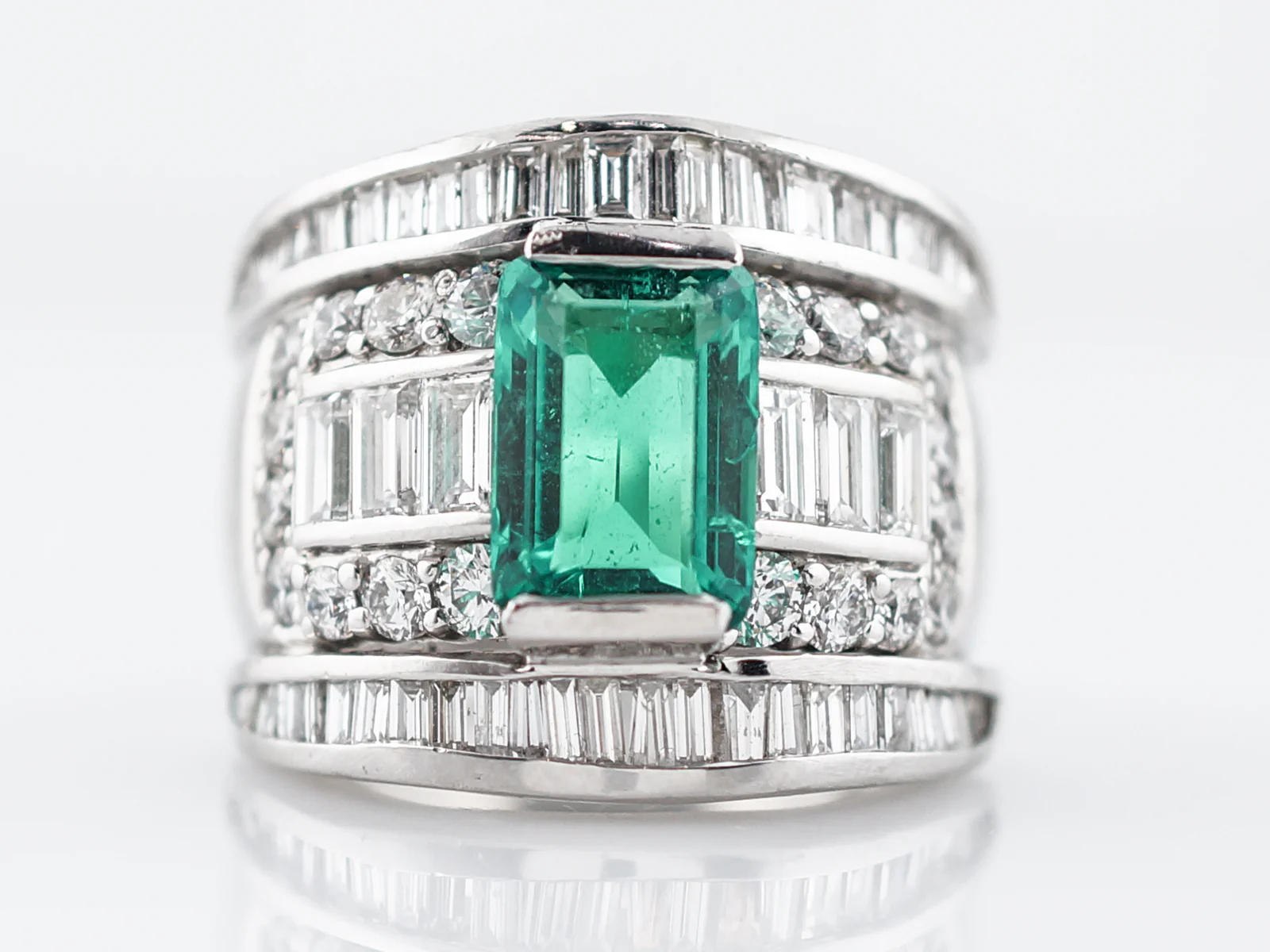 Right Hand Ring Modern GIA 3.08 Emerald Cut Emerald in Platinum