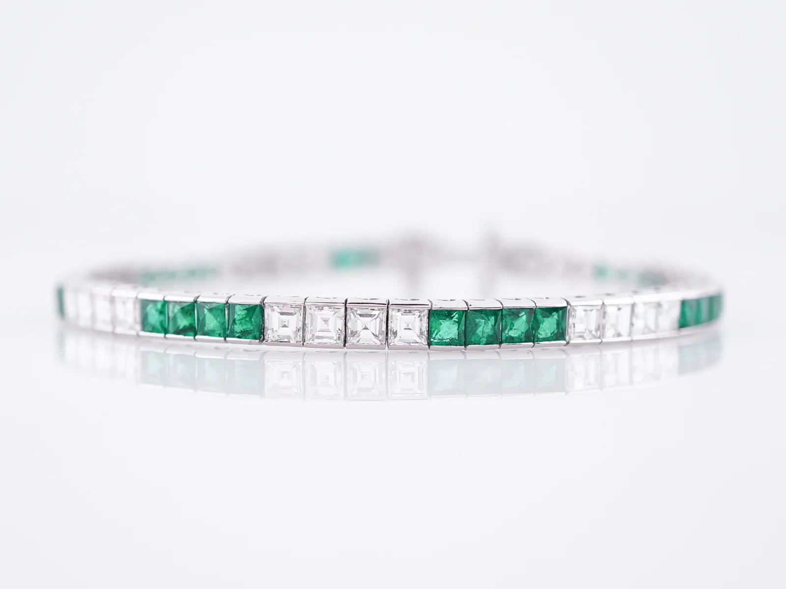 Straight Line Bracelet Modern 5.17 Emerald Cut Diamonds & 3.35 Step Cut Emeralds in Platinum