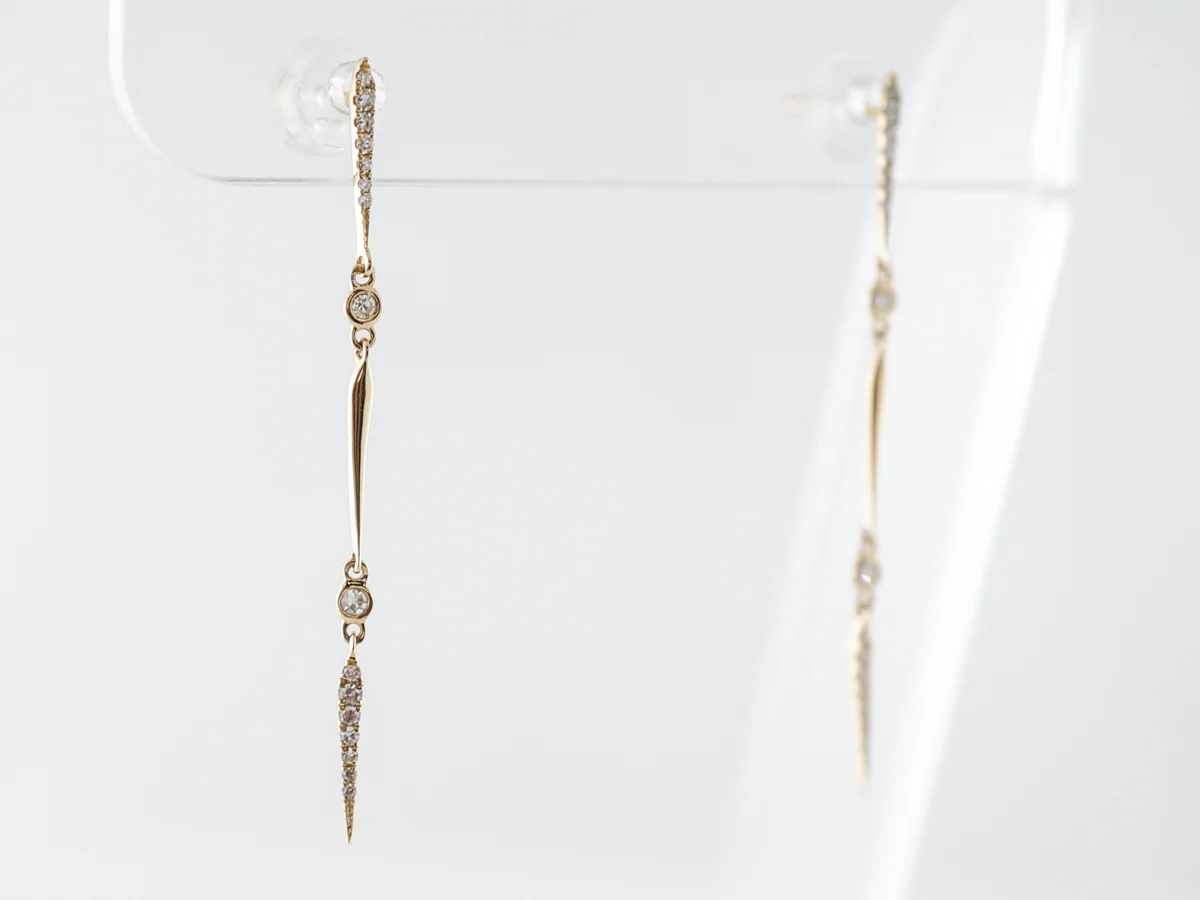 Thin Diamond Dangle Earrings in 18k Yellow Gold - Image 2