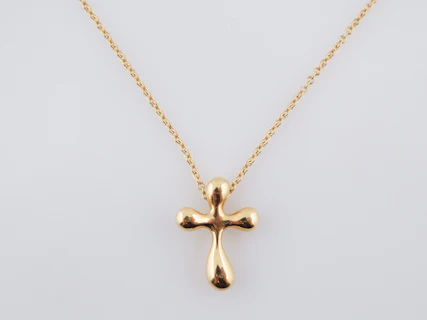 Tiffany and Co 18 karat Yellow Gold Cross Necklace Originally Designed By Elsa Perretti