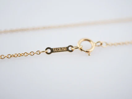 Tiffany and Co 18 karat Yellow Gold Cross Necklace Originally Designed By Elsa Perretti - Image 4