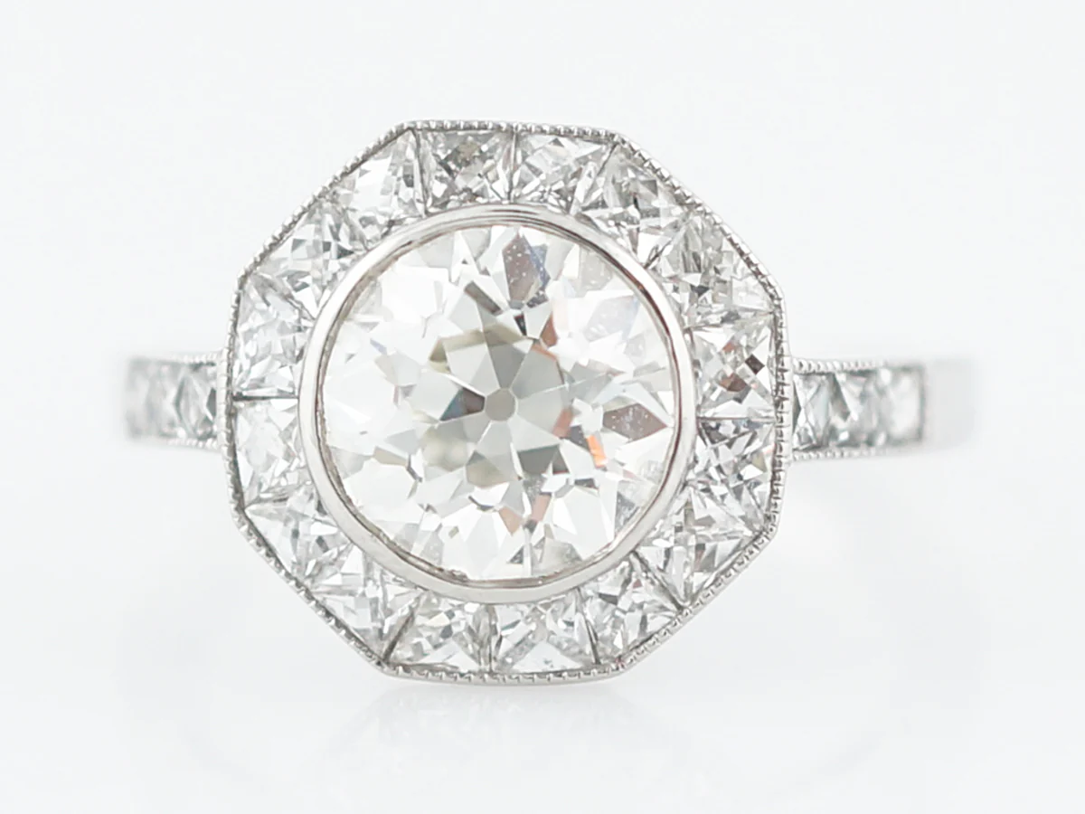 Vintage Style Diamond Halo Engagement Ring in Platinum